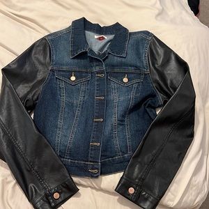 Jean jacket with faux black leather sleeves